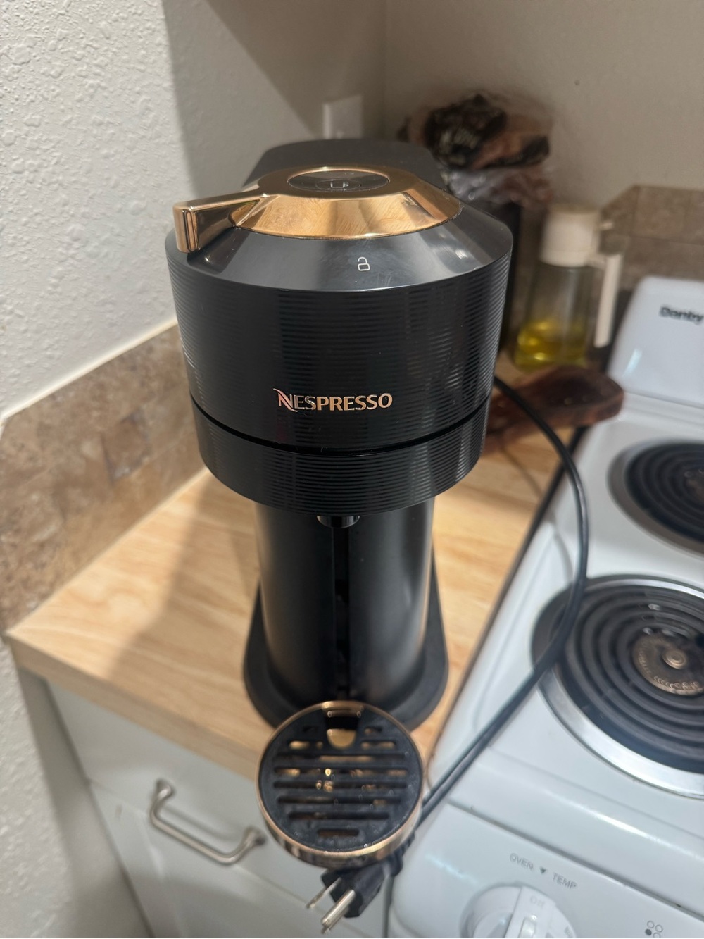 Nespresso Black with Gold Accent Espresso Machine